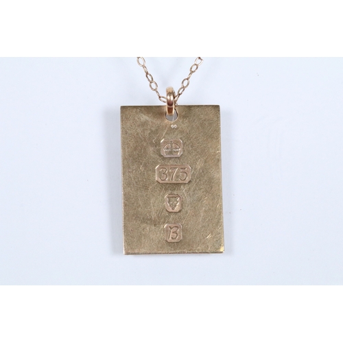 142 - 9ct gold ingot pendant (hallmarked London 1976) on a fine link chain (marked 9ct to the spring ring)... 