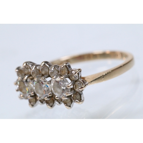 150 - 14ct gold and cz cluster ring set with round cut cz's. Marked 14k. Size Q.