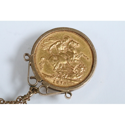 165 - 1876 Victorian full sovereign coin set into a 9ct gold mount with rope twist necklace chain and spri... 
