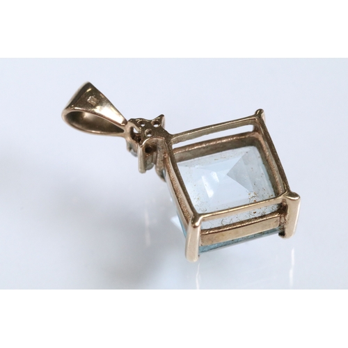 166 - 9ct gold and topaz pendant set with a square step cut topaz in a prong setting. Pendant hallmarked 9... 