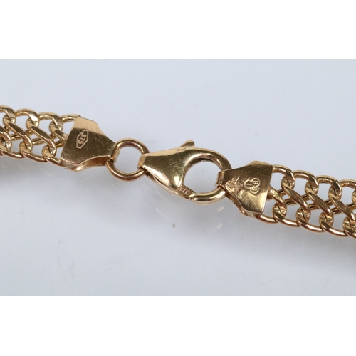 121 - 9ct gold double flat link bracelet with lobster clasp. Hallmarked Sheffield to clasp. Measures 7.5 i... 