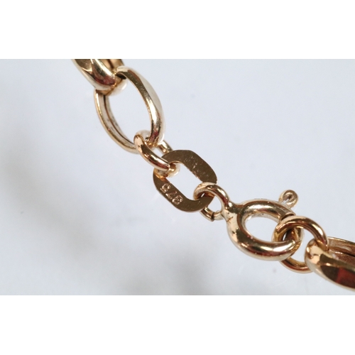 123 - 9ct gold oval link chain necklace with spring ring clasp (hallmarked Sheffield), together with a sil... 