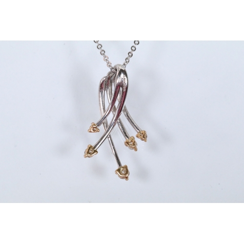 127 - 18ct white gold and diamond pendant necklace. The pendant of crossover form set with five round bril... 