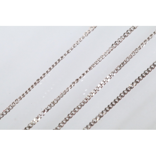 129 - Two 9ct gold pendant necklaces to include a black and white diamond pendant on a fine link chain (pe... 