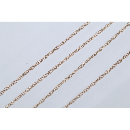 129 - Two 9ct gold pendant necklaces to include a black and white diamond pendant on a fine link chain (pe... 