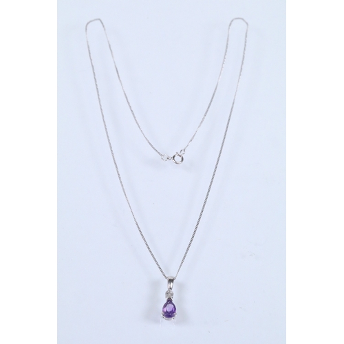 129 - Two 9ct gold pendant necklaces to include a black and white diamond pendant on a fine link chain (pe... 