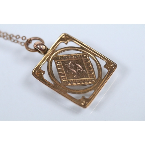 130 - 9ct gold pendant necklace having a fine link chain with a rectangular initial pendant with pierced d... 