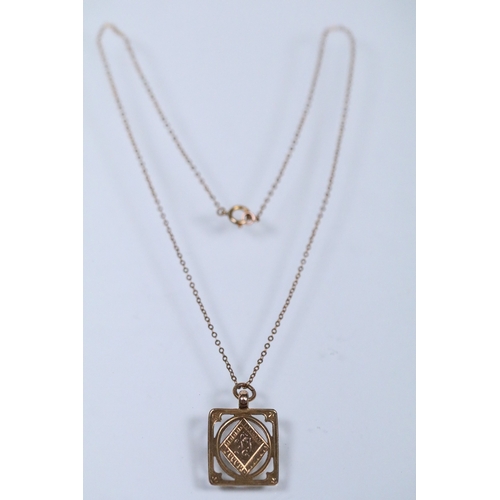 130 - 9ct gold pendant necklace having a fine link chain with a rectangular initial pendant with pierced d... 