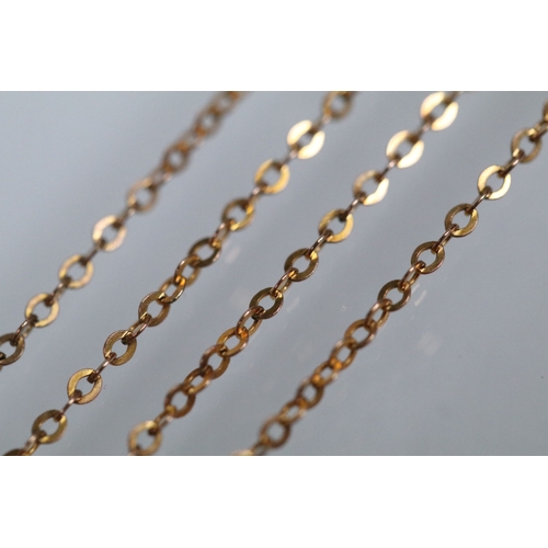 130 - 9ct gold pendant necklace having a fine link chain with a rectangular initial pendant with pierced d... 