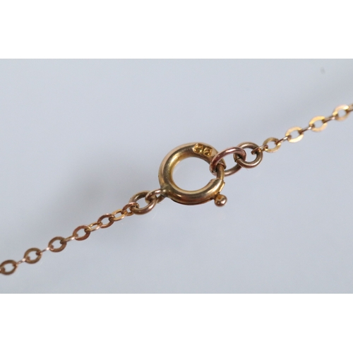 130 - 9ct gold pendant necklace having a fine link chain with a rectangular initial pendant with pierced d... 