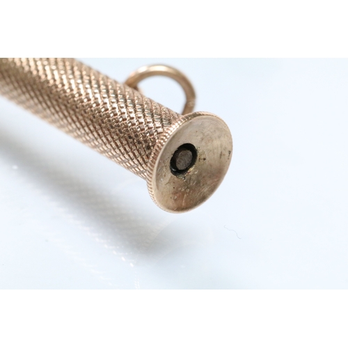 143 - 9ct gold cigar pricker having engine turned details and pendant bale. Hallmarked Birmingham 1947. Me... 