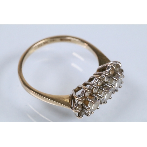 150 - 14ct gold and cz cluster ring set with round cut cz's. Marked 14k. Size Q.