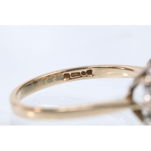 150 - 14ct gold and cz cluster ring set with round cut cz's. Marked 14k. Size Q.