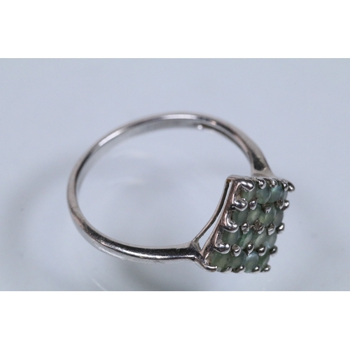 164 - 9ct white gold alexandrite cluster ring set with a diamond shaped cluster of round cut alexandrite s... 