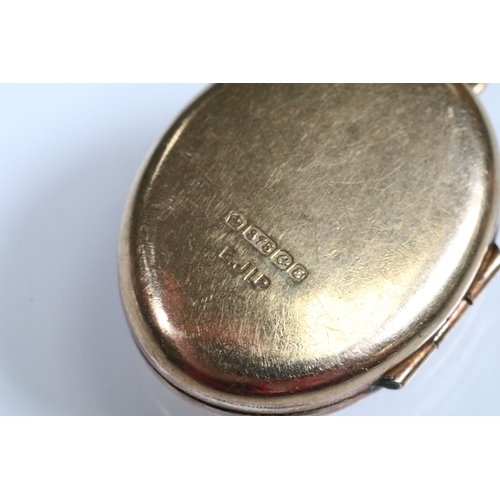 170 - 9ct gold locket on a rope twist chain with spring ring clasp. Locket hallmarked Birmingham 1979, cha... 