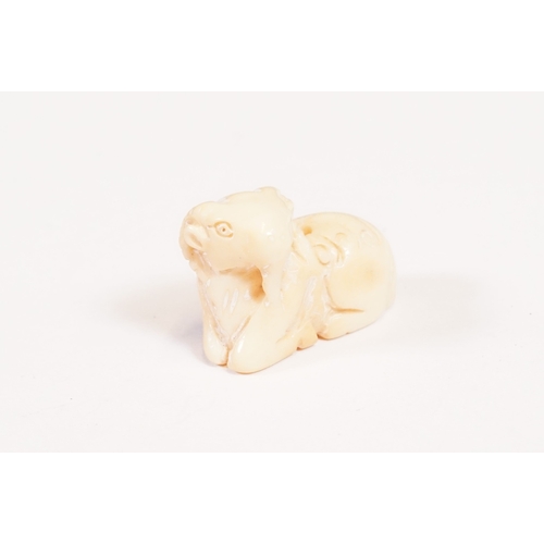 Four miniature carved netsuke figures to include 3 x wooden examples ...