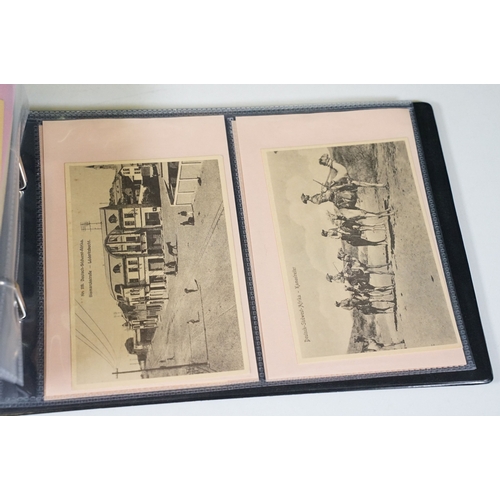 505 - A postcard album containing Ethnic, Native, South Africa, Aden, Africa and Egypt, real photo and pri... 