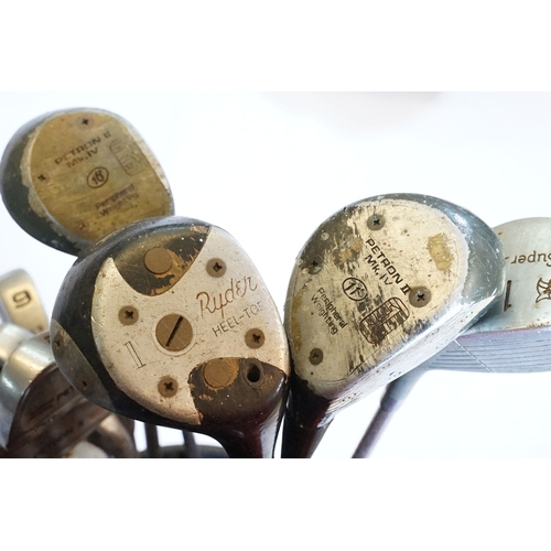 506 - Collection of golf clubs, to comprise examples by Petron, Dunlop, etc. contained within two leather ... 