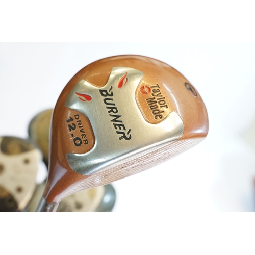 506 - Collection of golf clubs, to comprise examples by Petron, Dunlop, etc. contained within two leather ... 