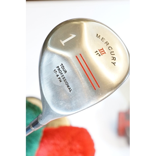 506 - Collection of golf clubs, to comprise examples by Petron, Dunlop, etc. contained within two leather ... 