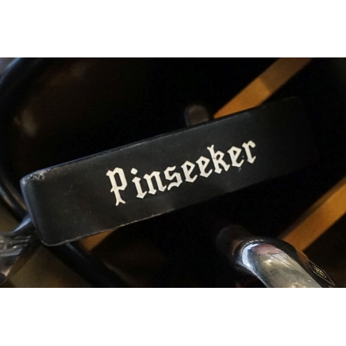 506 - Collection of golf clubs, to comprise examples by Petron, Dunlop, etc. contained within two leather ... 