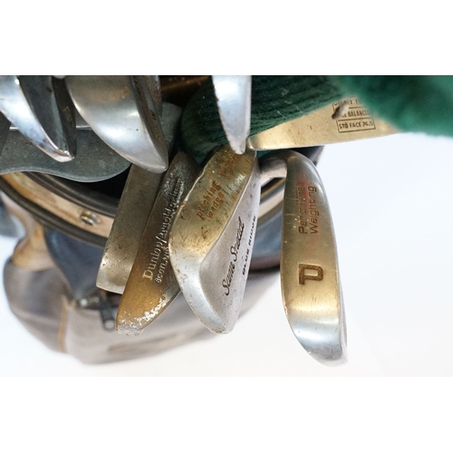 506 - Collection of golf clubs, to comprise examples by Petron, Dunlop, etc. contained within two leather ... 