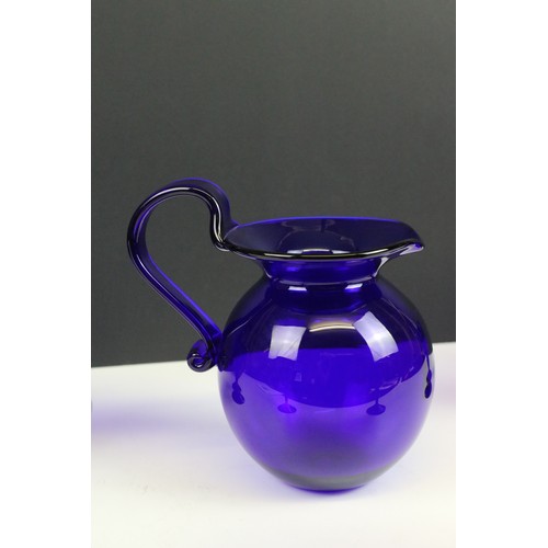 69 - Bristol Blue glass table set, comprising six glasses and a jug, H 15.5cm (7)