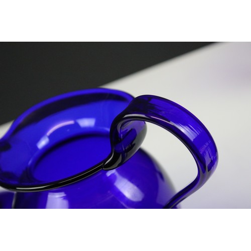 69 - Bristol Blue glass table set, comprising six glasses and a jug, H 15.5cm (7)