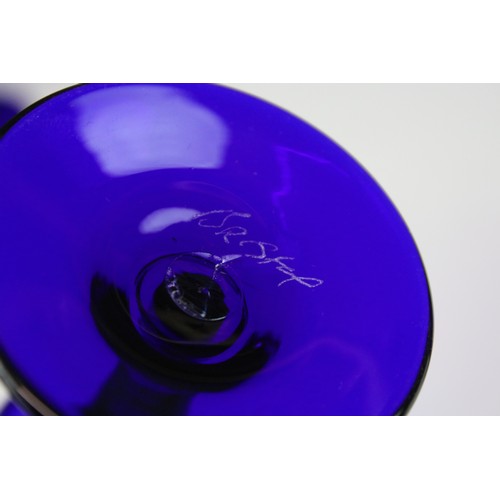 69 - Bristol Blue glass table set, comprising six glasses and a jug, H 15.5cm (7)