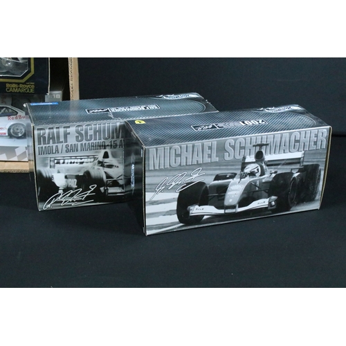 215 - Seven boxed 1/18 scale diecast models to include Mattel Hot Wheels Racing Michael Schumacher 2001 Wo... 