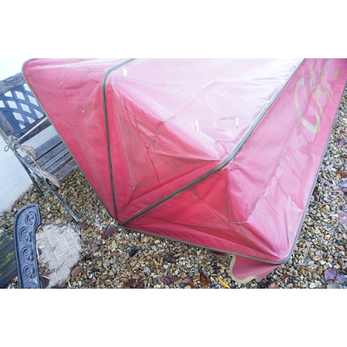 537 - Folding shop front canopy in burgundy with 'Cafe' inscription to front, L 250, D 100cm