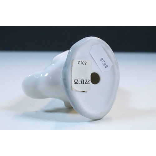 27 - Group of six Lladro and a Nao porcelain figurines to include rabbit, girl and dog, polar bear, cat, ... 