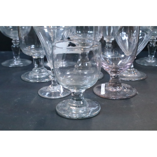 32 - Collection of Georgian and later glassware, to comprise a three-knopped stem glass, several rummers,... 