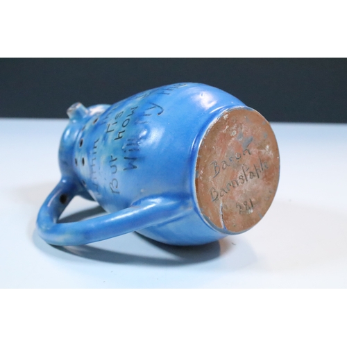 35 - Group of five Brannam Barum Barnstaple pottery pieces to include puzzle jugs, jug, vase and a grotes... 