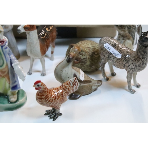 40 - Large selection of Wade and other assorted ceramic figurines to include Bear Ambition and Whimsies e... 