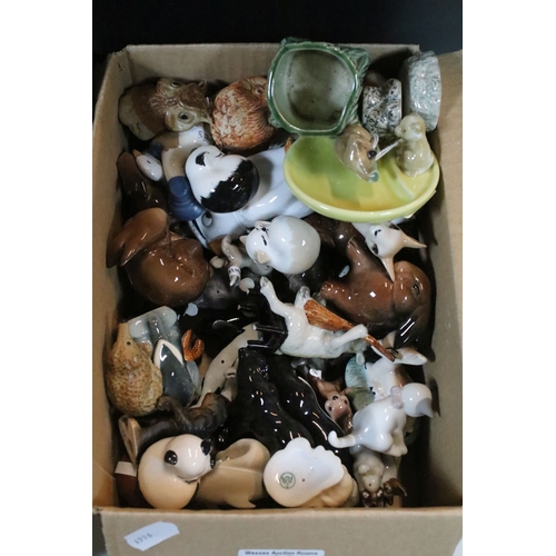 40 - Large selection of Wade and other assorted ceramic figurines to include Bear Ambition and Whimsies e... 