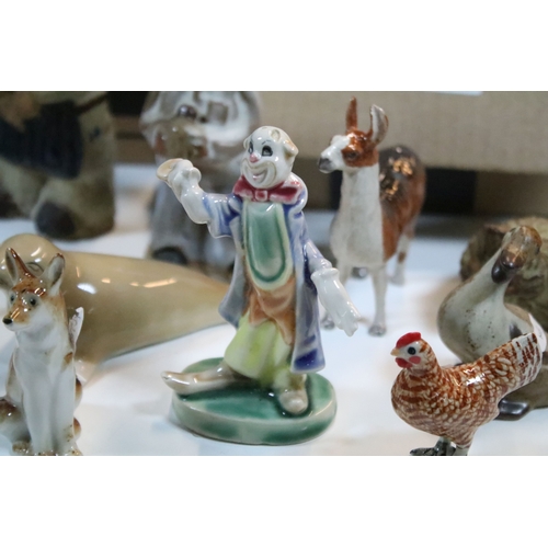 40 - Large selection of Wade and other assorted ceramic figurines to include Bear Ambition and Whimsies e... 