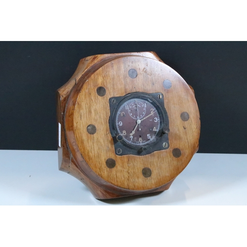 150 - Carly & Clemence Ltd, 1979 RAF aircraft cockpit clock mounted within a wooden presentation base with... 