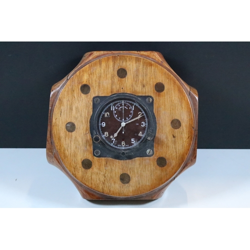 150 - Carly & Clemence Ltd, 1979 RAF aircraft cockpit clock mounted within a wooden presentation base with... 