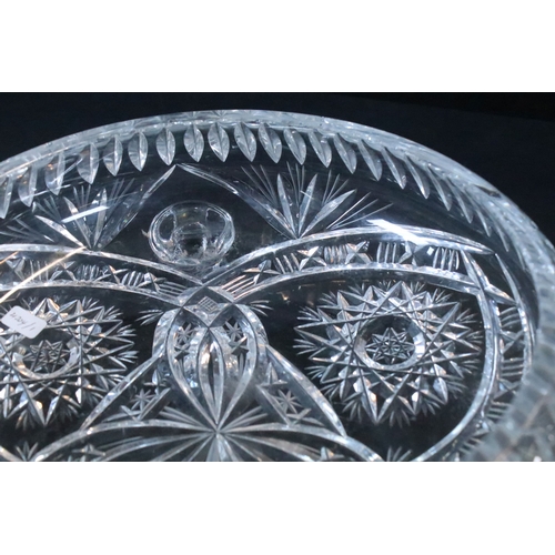 50 - Large crystal glass centre fruit bowl on three scrolled feet together with a four piece crystal glas... 