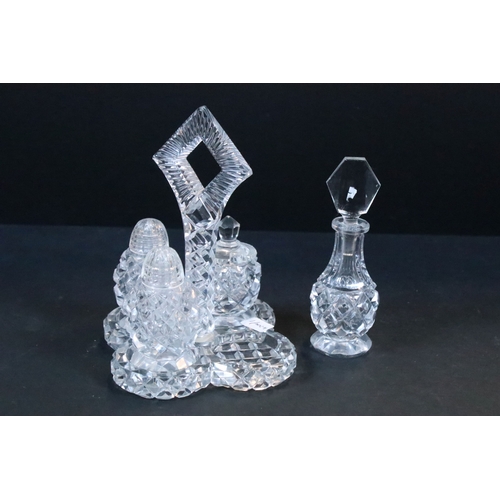 50 - Large crystal glass centre fruit bowl on three scrolled feet together with a four piece crystal glas... 