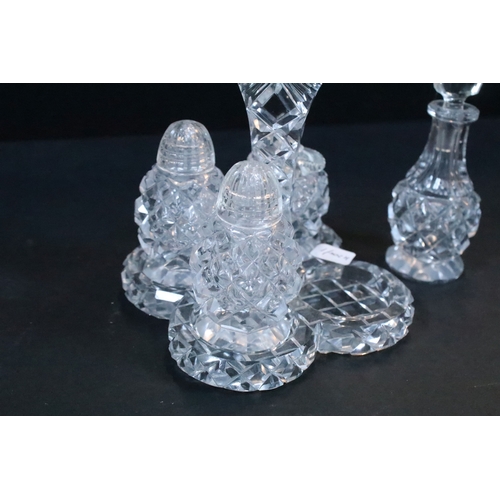 50 - Large crystal glass centre fruit bowl on three scrolled feet together with a four piece crystal glas... 