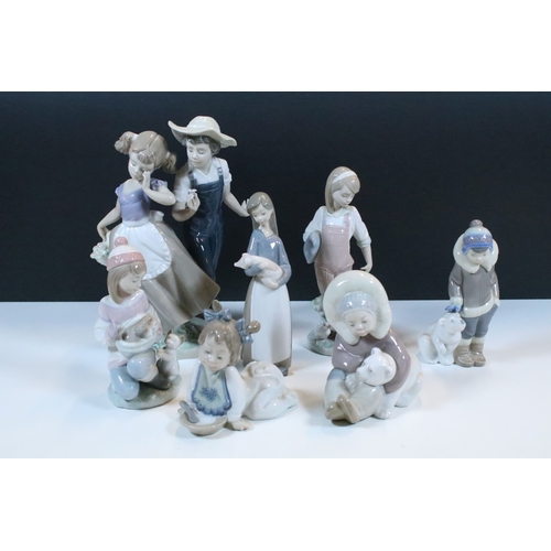 52 - Group of six Lladro porcelain figurines to include 'girl with polar bear', 'girl with pig', 'girl wi... 