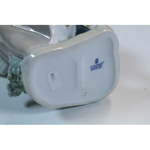 52 - Group of six Lladro porcelain figurines to include 'girl with polar bear', 'girl with pig', 'girl wi... 