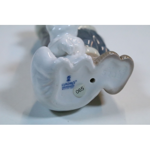 52 - Group of six Lladro porcelain figurines to include 'girl with polar bear', 'girl with pig', 'girl wi... 