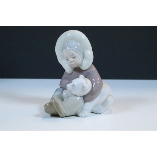 52 - Group of six Lladro porcelain figurines to include 'girl with polar bear', 'girl with pig', 'girl wi... 