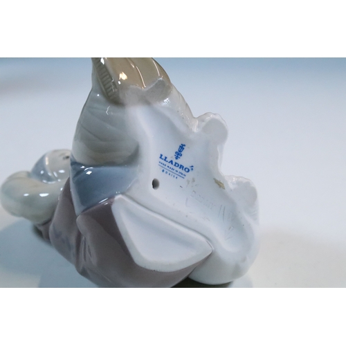 52 - Group of six Lladro porcelain figurines to include 'girl with polar bear', 'girl with pig', 'girl wi... 