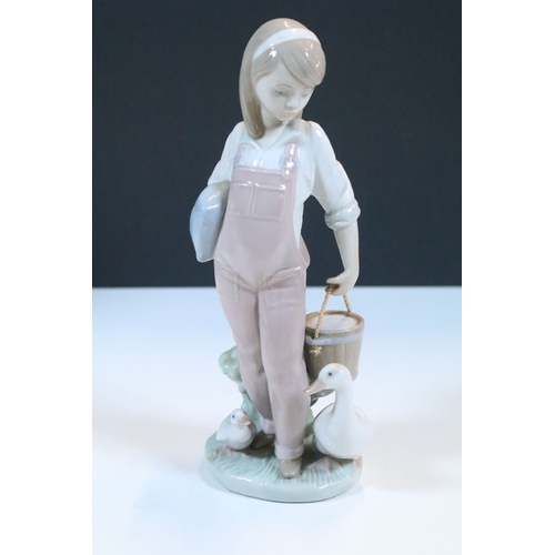 52 - Group of six Lladro porcelain figurines to include 'girl with polar bear', 'girl with pig', 'girl wi... 