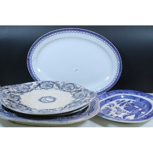 58 - Group of large blue and white pattern serving and meat platters to include willow pattern, Losol war... 