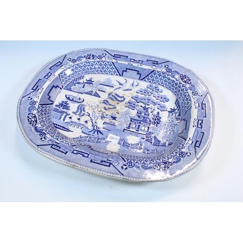 58 - Group of large blue and white pattern serving and meat platters to include willow pattern, Losol war... 